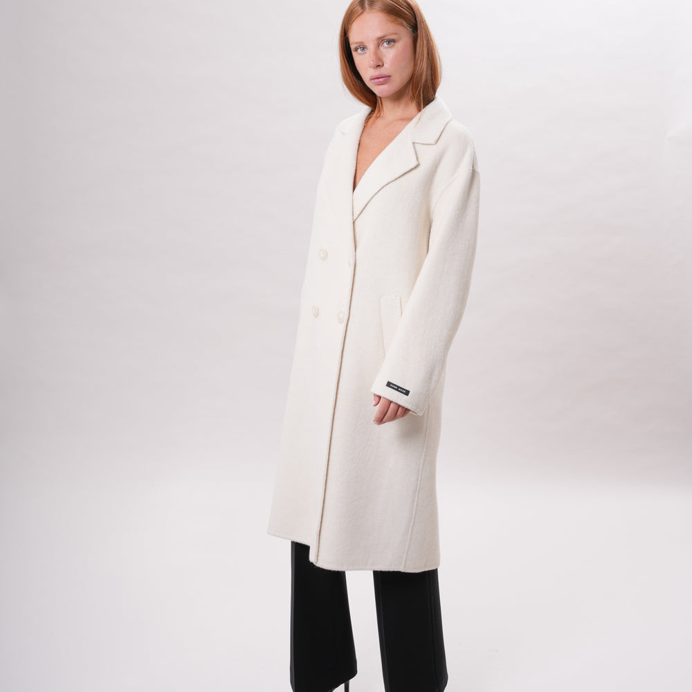
                      
                        PETER HADLEY WOMAN - Cappotto in lana handmade
                      
                    